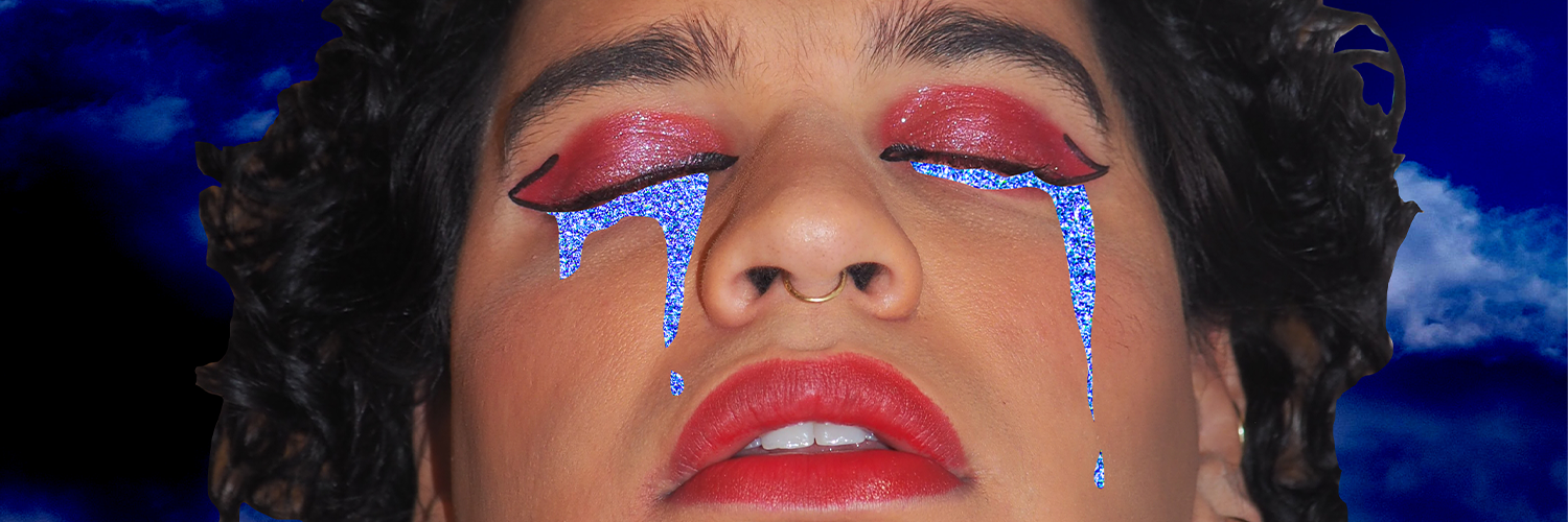 A closeup on a person of colour with their eyes closed with red eye makeup, lipstick, and blue glitter around their eyes