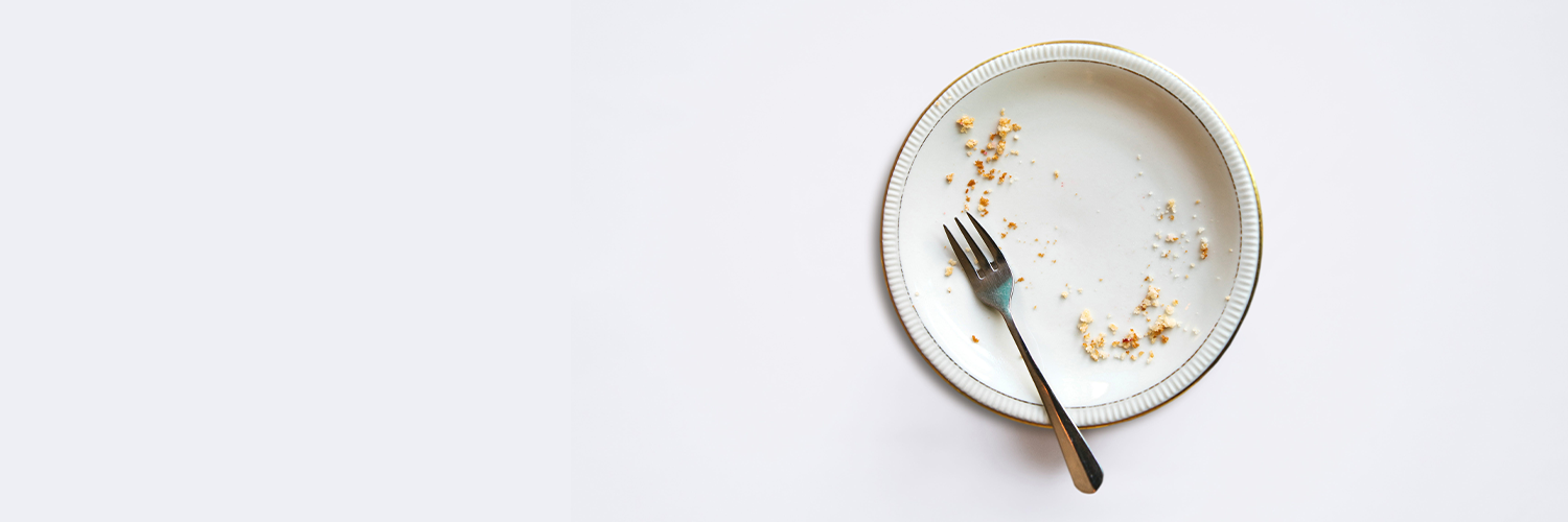 A plate with just crumbs and a fork on it, against a white background. The lead artwork for Phaedra, a new intoxicating re-imagining of the classic story, part of the ALRA graduate shows at Omnibus Theatre.